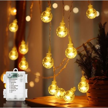 Aigostar - LED-Außen-Lichterkette 100×LED/3×AA/8 Funktionen 10,3 m IP44 warmweiß