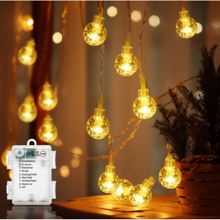 Aigostar - LED-Außen-Lichterkette 100×LED/3×AA/8 Funktionen 10,3 m IP44 warmweiß