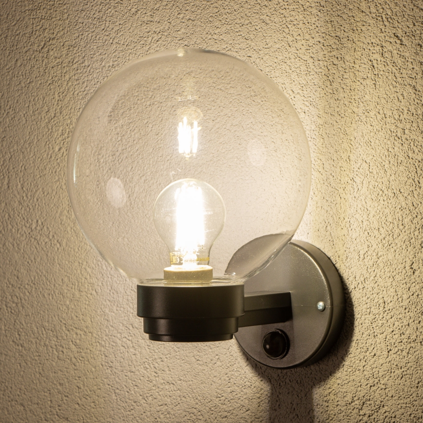 BRILAGI - Außen-Wandleuchte mit Bewegungsmelder HARBOR 1xE27/40W/230V IP33 schwarz/klar