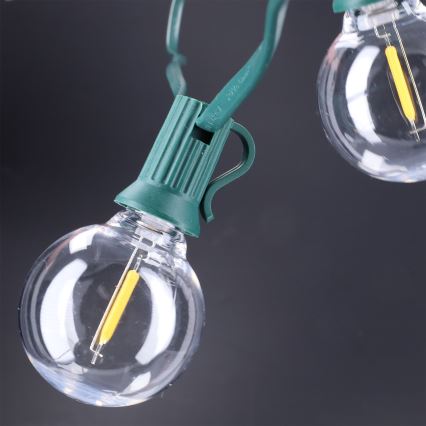 Brilagi - LED-Außen-Dekorationskette GIRLANDA 25xE12/0,8W/230V 20m grün IP44 warmweiß