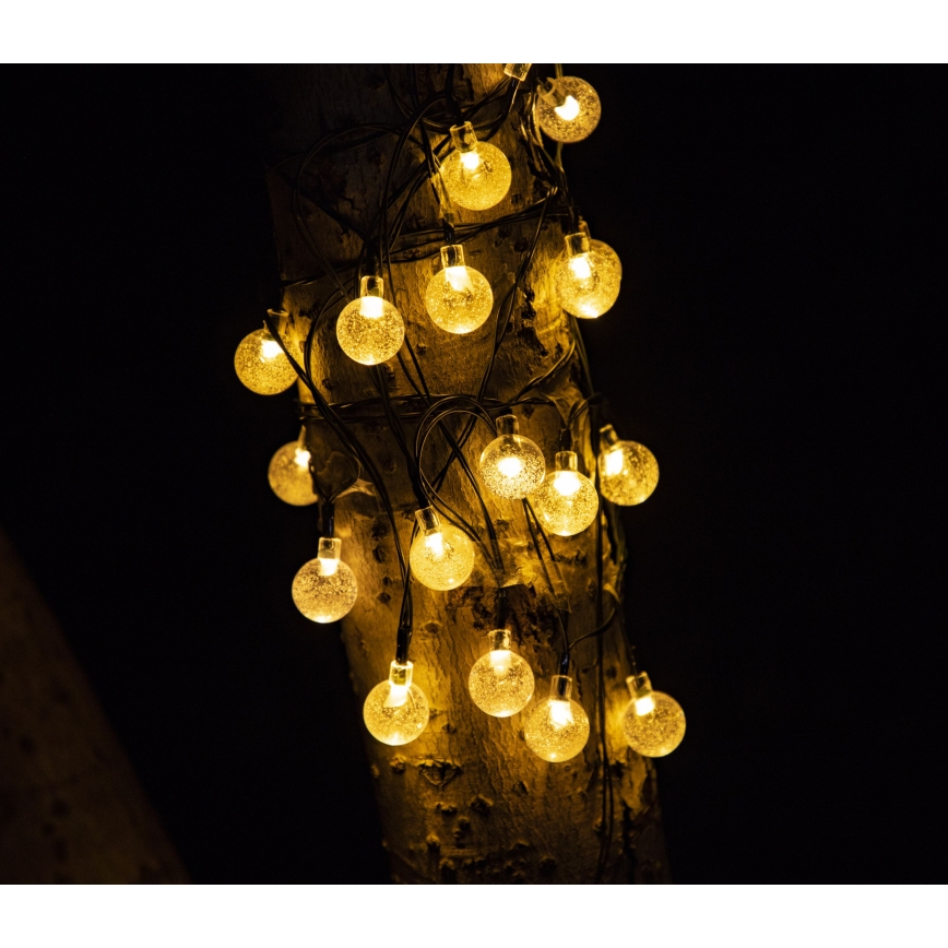 Dekorative LED-Solarkette BUBBLE GLASS 20xLED/8 Funktionen 4,85 m 600 mAh IP44 warmweiβ