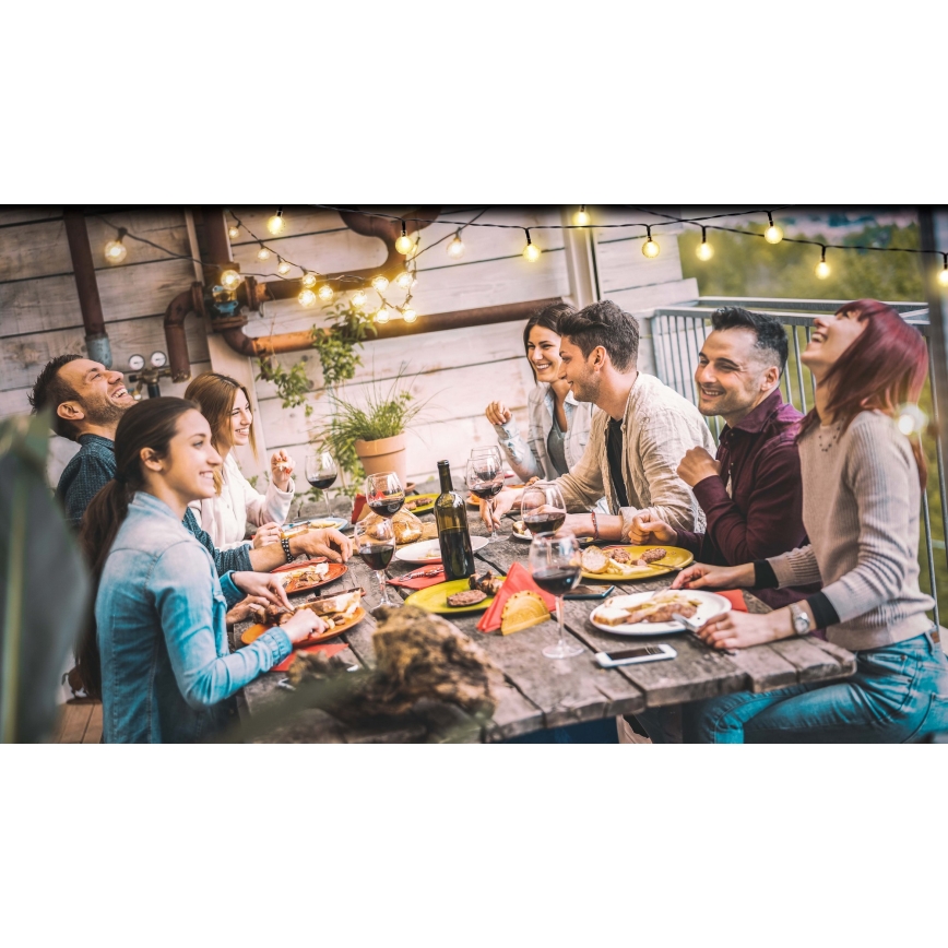 Grundig - LED dimmbare Solar-Lichterkette 50xLED/8 Funktionen 9,35 m warmweiß 1200 mAh + Fernbedienung