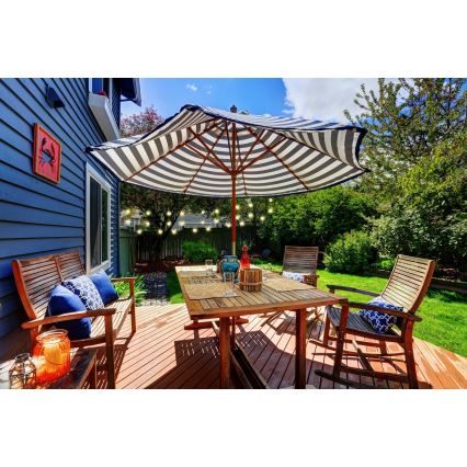 Grundig - LED dimmbare Solar-Lichterkette 50xLED/8 Funktionen 9,35 m warmweiß 1200 mAh + Fernbedienung