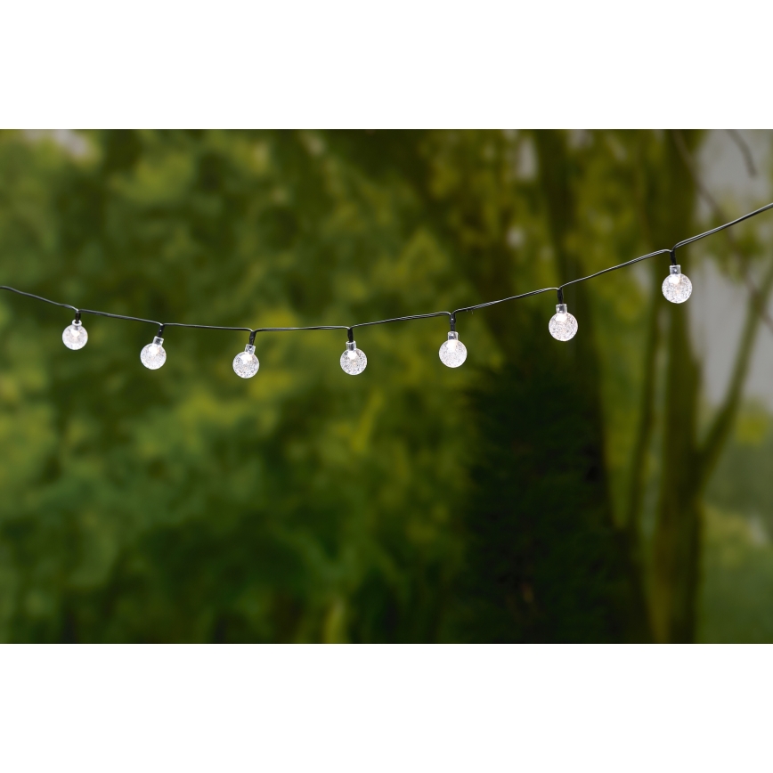 Grundig - LED-Solarlichterkette 50xLED/8 Funktionen 6,9m warmweiβ