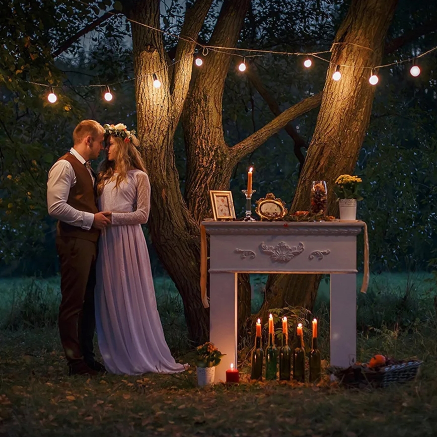 LED Außen-Dekorationskette 10xE27/1W/230V 10 m IP65 schwarz