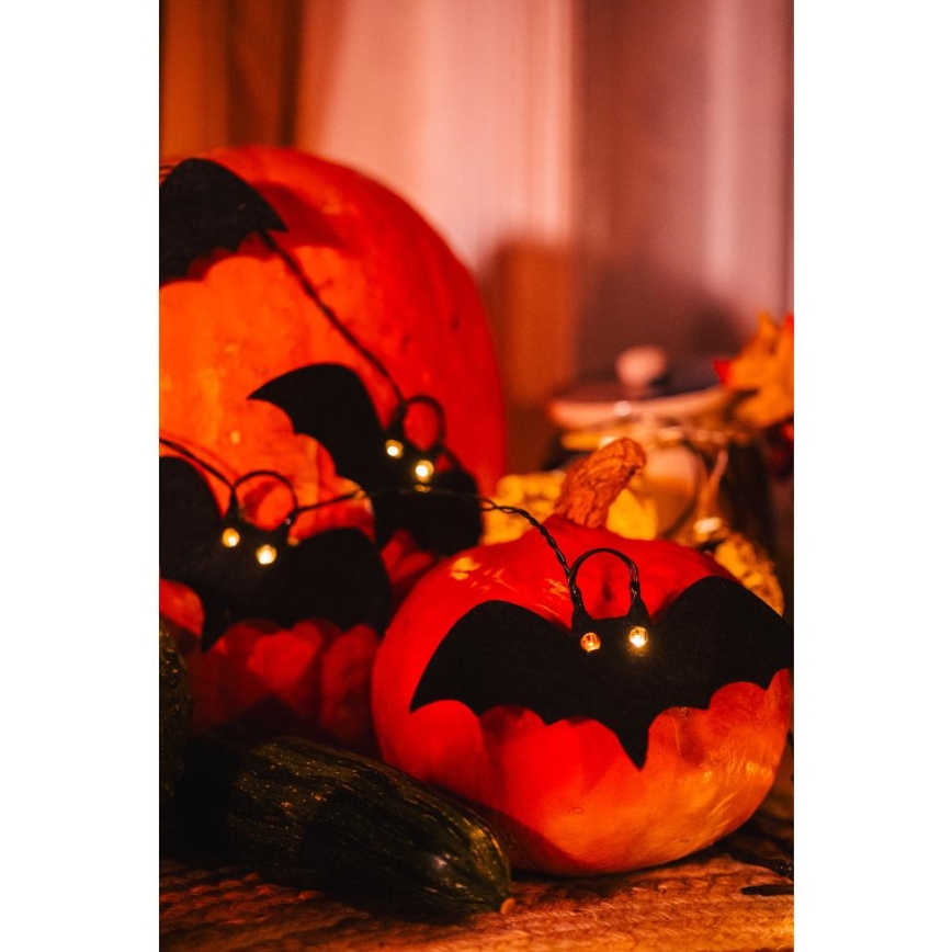 Dekorative LED-Kette HALLOWEEN 10xLED/2xAA/warmweiβ 1,3m Fledermäuse