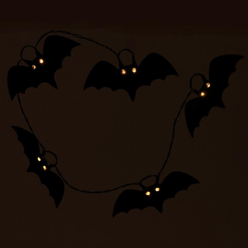 Dekorative LED-Kette HALLOWEEN 10xLED/2xAA/warmweiβ 1,3m Fledermäuse