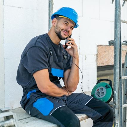 Retlux - Verlängerungskabel auf Kabeltrommel, 3-fach, Typ E, 10 m, grün/schwarz