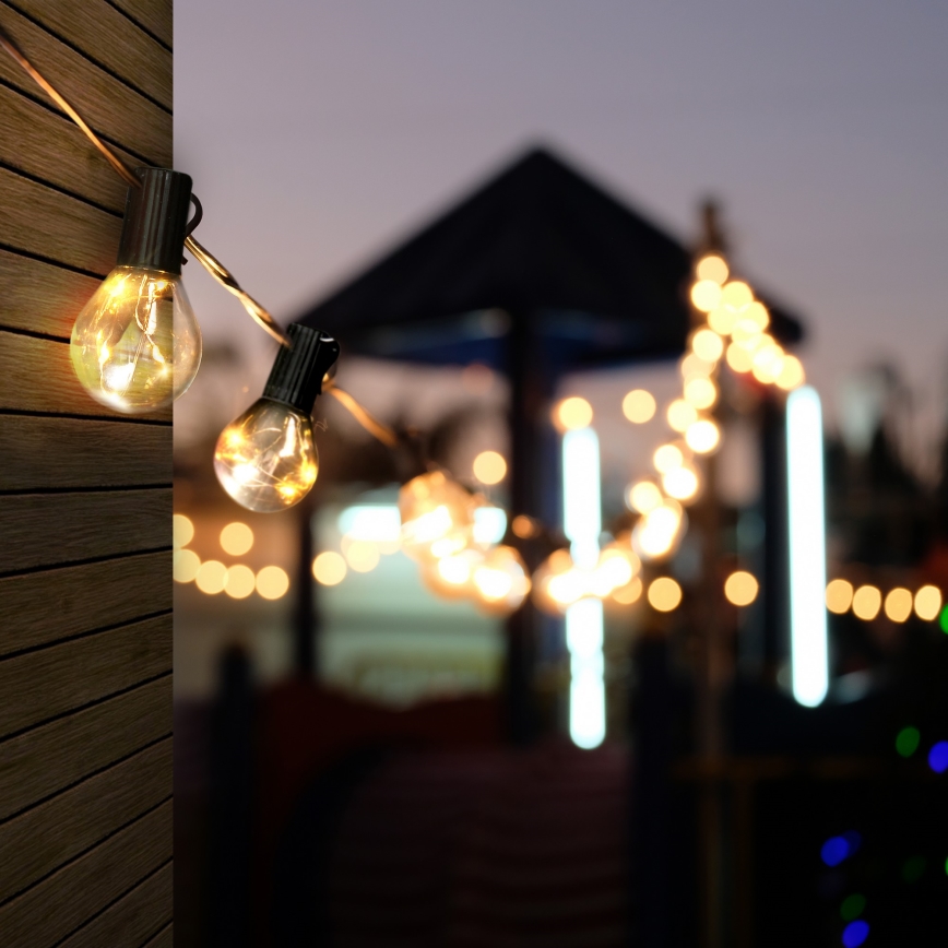 Dekorative LED-Outdoor-Lichterkette GARLAND 10xLED/3xAA 3m IP44 warmweiβ